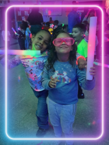 girl smiling with LED lights